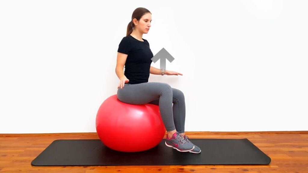 Upogib kolka na švicarski žogi korak 2